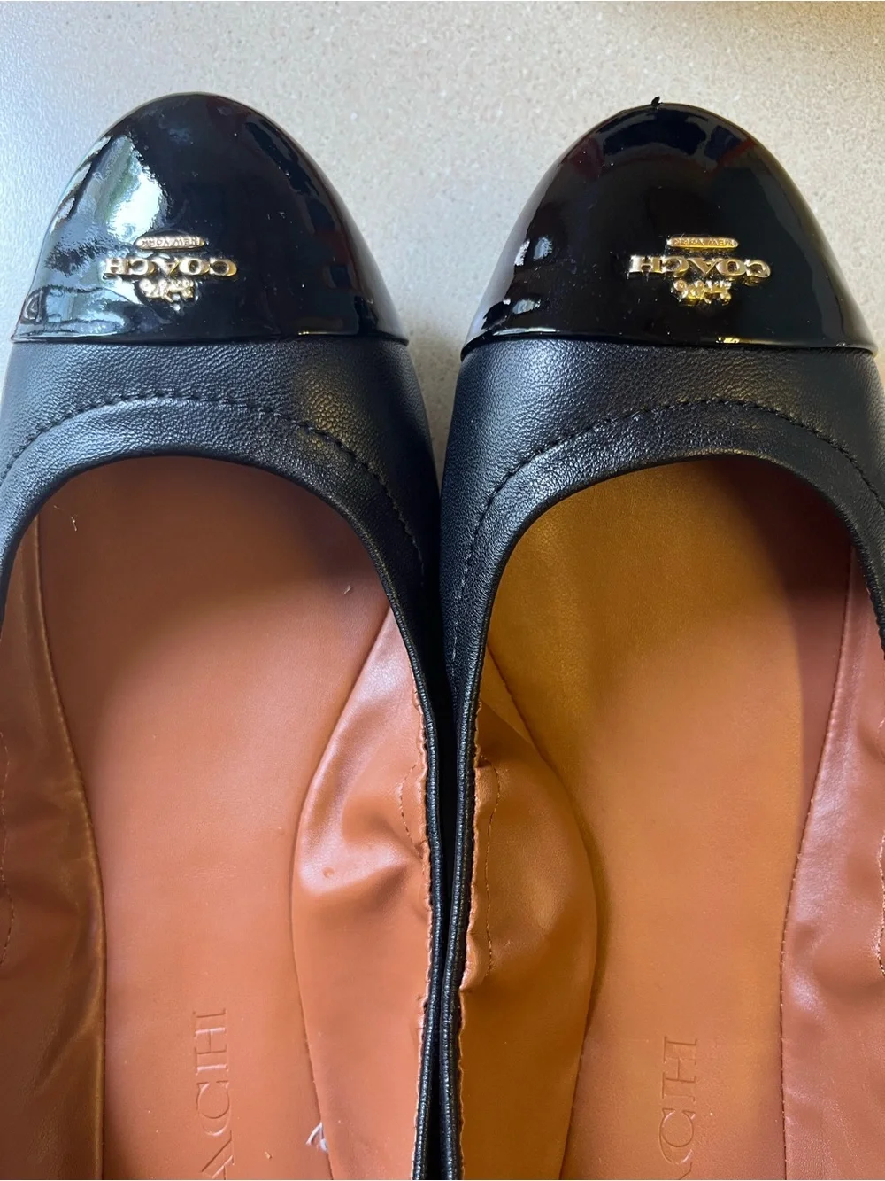 Coach Black Leather Ballet Flats with Patent Black Toe and Gold Logo. Sz: 7B